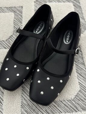 Black studded flats